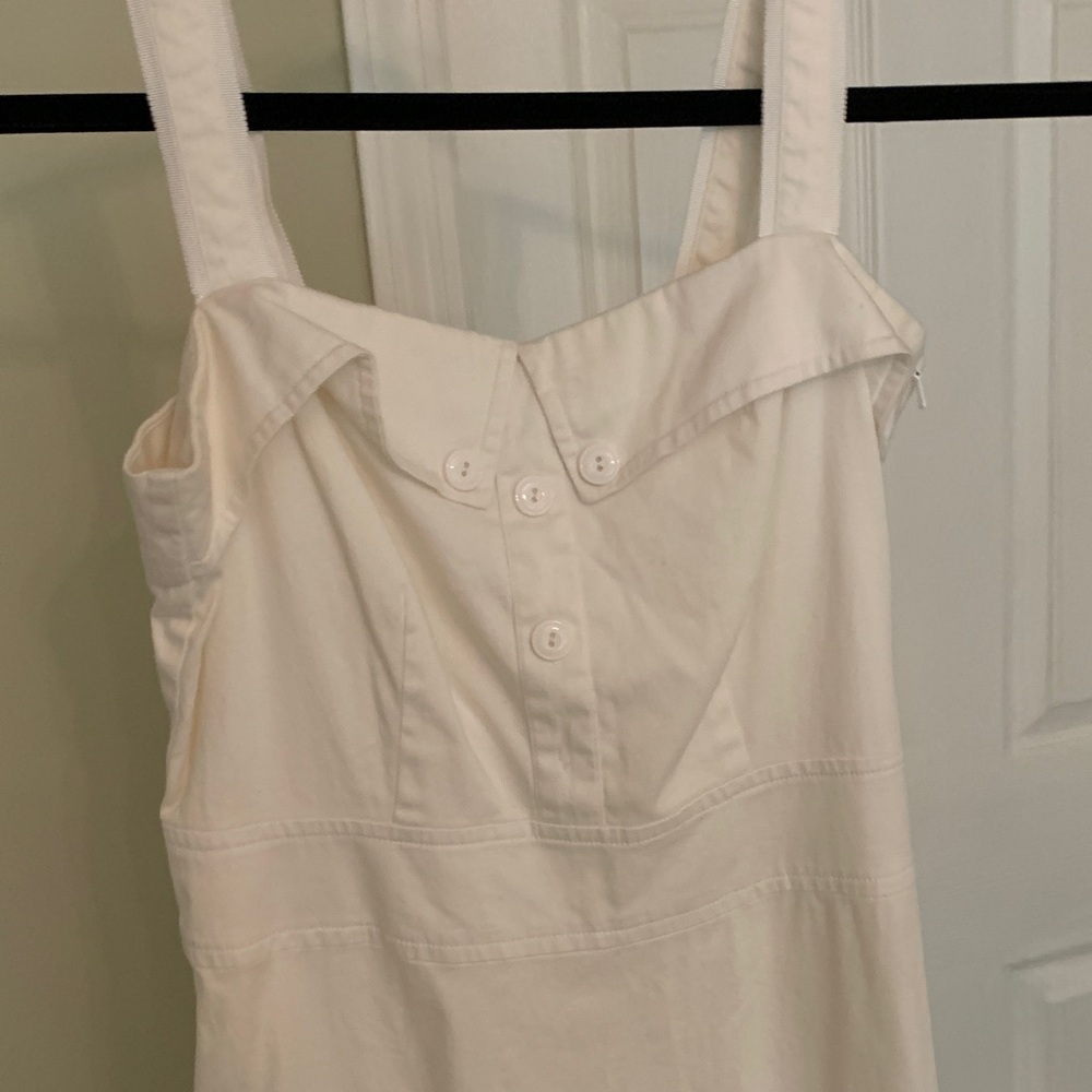 White mid length button detail dress
